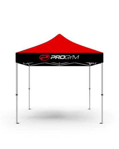 Tente promotionnelle ProGym rouge et noire avec logo blanc et rouge, utilisée pour événements extérieurs.